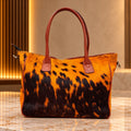 Orange and Black Hair-On Hide Tote Bag with Reddish-Brown Handles