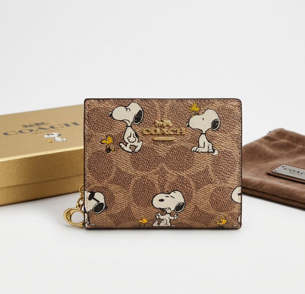 NWT Coach X Peanuts Snap Wallet In Signature Canvas With Snoopy Print CBN32 Tan