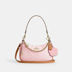 COACH Teri Shoulder Bag CEA20 – Gold / Powder Pink Signature with Charms – NWT 2026